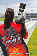 Tara Bowker of Black Rock Photography Prepares to Take photos of the Stanley And Weiss Racing Cadillac CTS-V PDRA Pro Extreme Pro Mod With Wicked Grafixx PDRA logo on her shirt